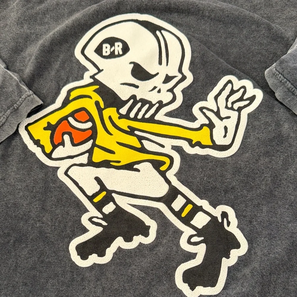 Black Men Gridiron T-Shirt with skeleton playing football as back hit  Logo - Picture 3 of 5